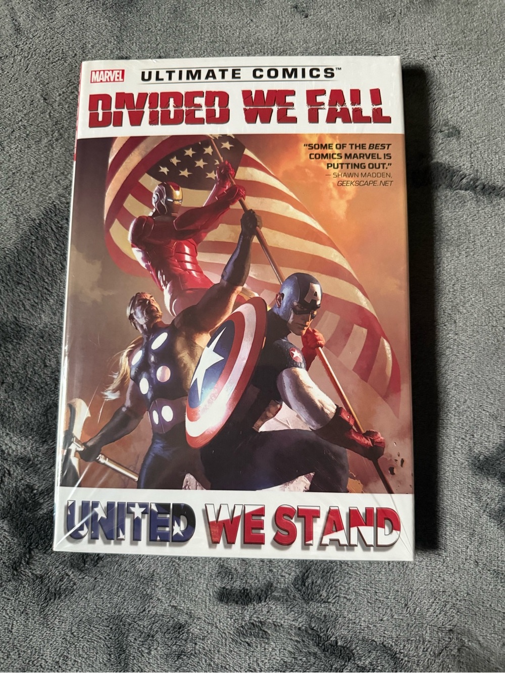 Ultimate Comics Divided We Fall United We Stand Marvel Comics, hardcover.